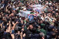 Iran's President Raisi buried at holy shrine in home city of Mashhad