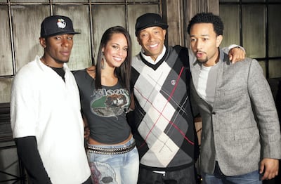 NEW YORK - FEBRUARY 24: (L-R) Rapper Mos Def, musician Alicia Keys, producer Russell Simmons, and musician John Legend pose for a photo during rehearsals for HBO and Russell Simmons' "Def Poetry Jam" on February 24, 2005 in New York City.  (Photo by Scott Gries/Getty Images)