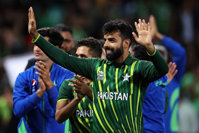 Pakistan's Shadab Khan celebrates with teammates after the match.