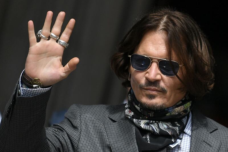 (FILES) In this file photo taken on July 23, 2020 US actor Johnny Depp arrives to attend his libel trial against News Group Newspapers (NGN), at the High Court in London. Hollywood star Johnny Depp on Friday, November 6, confirmed he will appeal against a UK court ruling that upheld claims he was violent towards his ex-wife Amber Heard. / AFP / DANIEL LEAL-OLIVAS

