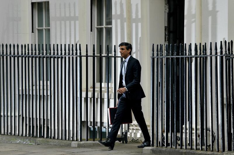 Rishi Sunak departs to deliver the annual Budget. Getty Images