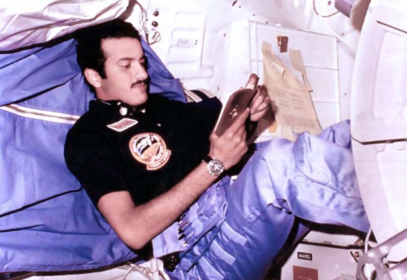 Prince Sultan bin Salman reading the Quran on board the Space Shuttle in 1985. Photo: 'Seven Days in Space' book