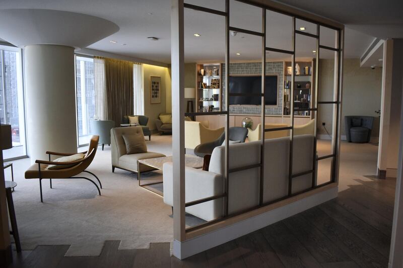 The living room of a penthouse in Circus West Village, which is already open and overlooking the Battersea Power Station with balcony views over the River Thames. Shafi Musaddique / The National