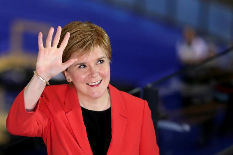 Scottish First Minister Nicola Sturgeon gestures as she gives a TV interview at a counting centre, in Glasgow, Scotland, Britain, May 7, 2021. REUTERS/Russell Cheyne