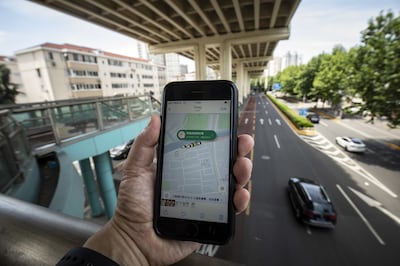 The Didi ride-hailing app on a smartphone in Shanghai, China. Bloomberg