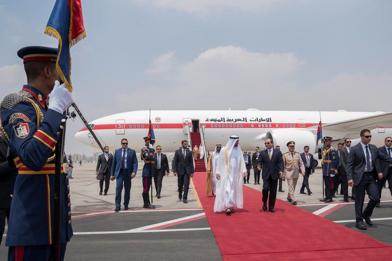 CAIRO, EGYPT - August 07, 2018: HH Sheikh Mohamed bin Zayed Al Nahyan Crown Prince of Abu Dhabi and Deputy Supreme Commander of the UAE Armed Forces (centre L), is received by HE Abdel Fattah El Sisi, President of Egypt (centre R), upon arrival at Cairo international Airport, commencing an official visit. Seen with HH Sheikh Nahyan Bin Zayed Al Nahyan, Chairman of the Board of Trustees of Zayed bin Sultan Al Nahyan Charitable and Humanitarian Foundation (back C).

( Mohamed Al Hammadi / Crown Prince Court - Abu Dhabi )
---