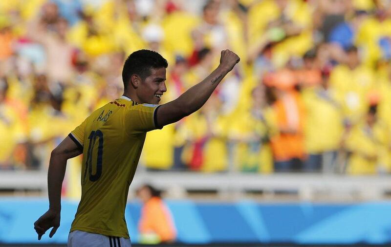 James Rodriguez celebrates his goal on Saturday in Colombia's 3-0 win over Greece at the 2014 World Cup in Belo Horizonte, Brazil. Sergio Perez / Reuters