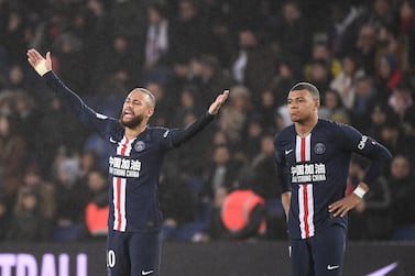Paris Saint-Germain's Brazilian forward Neymar (L) reacts during the French L1 football match between Paris Saint-Germain (PSG) and Girondins de Bordeaux at the Parc des Princes stadium in Paris, on February 23, 2020. / AFP / FRANCK FIFE