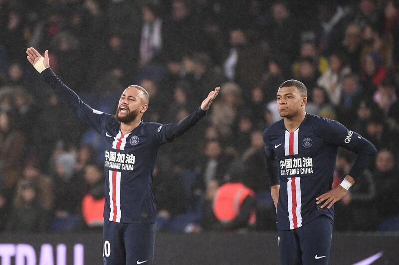 Paris Saint-Germain's Brazilian forward Neymar (L)  reacts  during the French L1 football match between Paris Saint-Germain (PSG) and Girondins de Bordeaux at the Parc des Princes stadium in Paris, on February 23, 2020. / AFP / FRANCK FIFE
