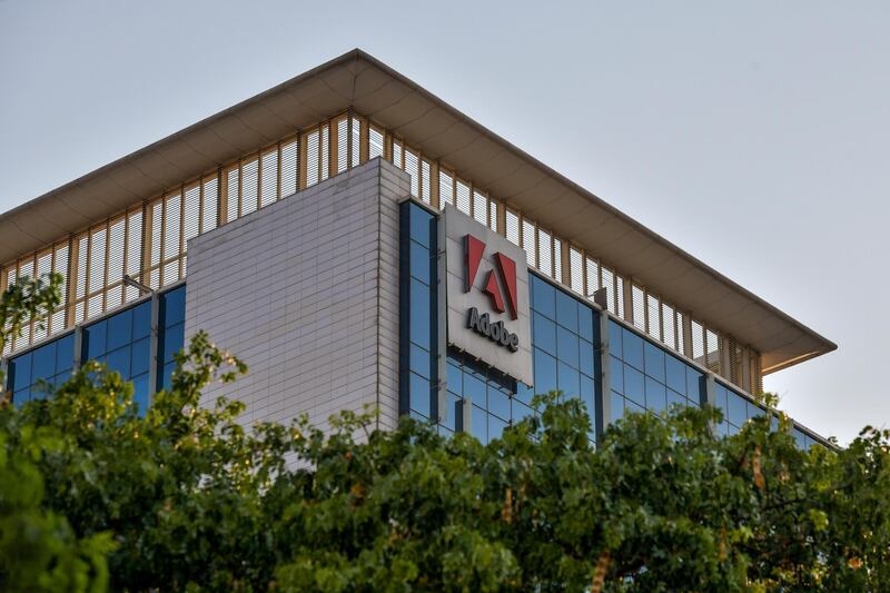 In this photo taken on April 16, 2020, a general view shows the Indian office of US multinational computer software company Adobe in Bangalore. - Coronavirus is permanently shaking up the global outsourcing industry as lockdowns from Bangalore to Manila prompt firms to "reshore" jobs and, with AI, to move further away from needing humans at all. (Photo by Manjunath Kiran / AFP) / To go with 'INDIA-HEALTH-VIRUS-COMPUTERS-BUSINESS' by Ammu Kannampilly, with Cecil MORELLA in Manila