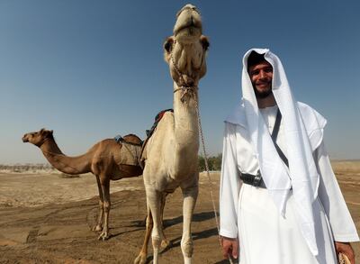 Abu Dhabi, October, 05, 2018: Mike Metzger who is setting off on a 10 day trek across the desert on camel  from Abu Dhabi to Al Ain pose with his camles on the outskirts of AbuDhabi . Satish Kumar for the National/ Story by Gillian Duncan