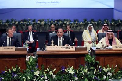 Egypt's President Abdel-Fattah El-Sisi, center, chairs a meeting at an EU-Arab summit at the Sharm El Sheikh convention center in Sharm El Sheikh, Egypt, Sunday, Feb. 24, 2019. Leaders from European Union and Arab League countries are holding their first-ever summit, meeting in the Egyptian resort city of Sharm el-Sheikh to discuss migration, security and business deals. (AP Photo/Francisco Seco)