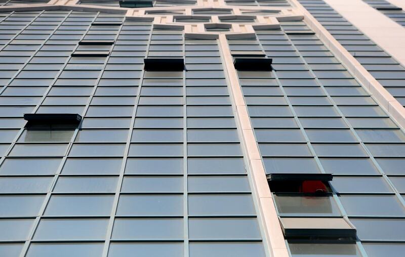 Windows in some high-rise buildings have no safety locks for kids who are left unattended. Ravindranath K / The National