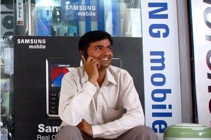 Revenue in the Indian handset market grew by 15 per cent to 331.7 billion rupees last year from 288.9bn rupees the previous year, according to an annual survey by the Indian telecommunications industry journal Voice&Data. Sanjit Das / Bloomberg News