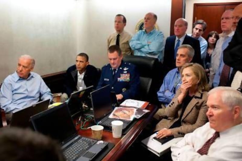 Barack Obama, the US president, second from left, with Joe Biden, the vice president, left, Robert Gates, the US secretary of defence, right, and Hillary Clinton, the secretary of state, second from right, receive an update on the mission against Osama bin Laden at the White House on May 1, 2011. Official White House Photo by Pete Souza via AFP