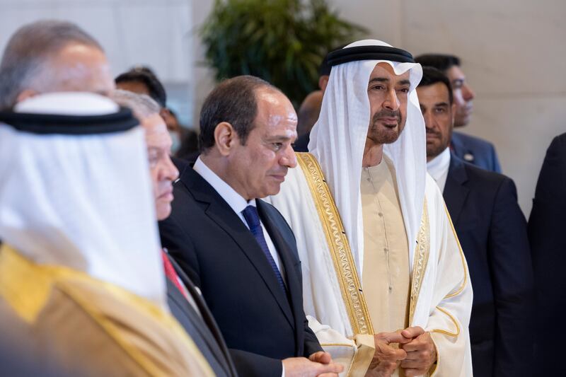Sheikh Mohamed and Mr El Sisi look at the model of the Regal Heights Hotel.

