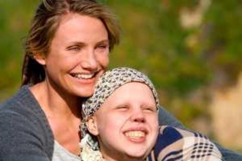 (L-r) Sara (CAMERON DIAZ) enjoys a good day on the beach with her cancer patient daughter Kate (SOFIA VASSILIEVA) in New Line Cinema’s drama “My Sister’s Keeper,” distributed by Warner Bros. 

Sidney Baldwin/Warner Brothers