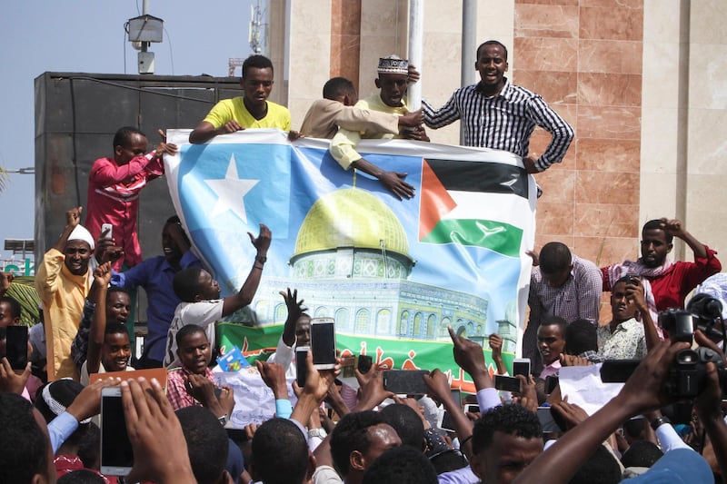 Hundreds of Somalis gather to protest against US president Donald Trump in Mogadishu, Somalia, on December 8, 2017. Said Yusuf Warsam / EPA