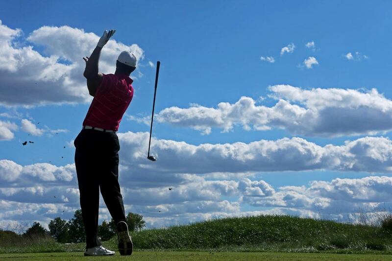 CARMEL, IN - SEPTEMBER 08: Tiger Woods drops his club as he watches his tee shot on the tenth hole during the third round of the BMW Championship at Crooked Stick Golf Club on September 8, 2012 in Carmel, Indiana.   Warren Little/Getty Images/AFP== FOR NEWSPAPERS, INTERNET, TELCOS & TELEVISION USE ONLY ==

