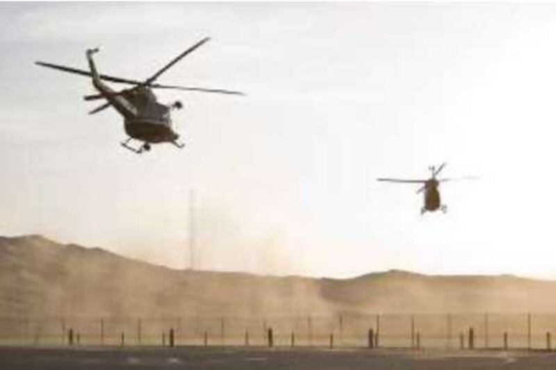 Liwa Oasis, Abu Dhabi - October 29, 2008: Search and Rescue helicopters from Abu Dhabi Police take off from the Helipad at the Moreeb Hill bivouac.  ( Philip Cheung / The National )  *** Local Caption ***  PC0012-Medical.jpgPC0012-Medical.jpg