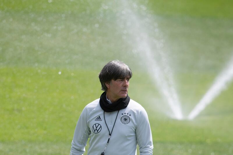 Coach Joachim Low watches the session in Austria. Getty