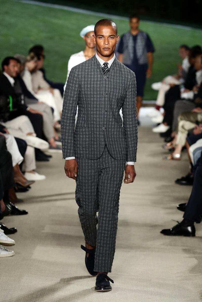 A model walks the runway during the Giorgio Armani show at Milan Men's Fashion Week on June 21, 2021 in Milan, Italy. Getty Images