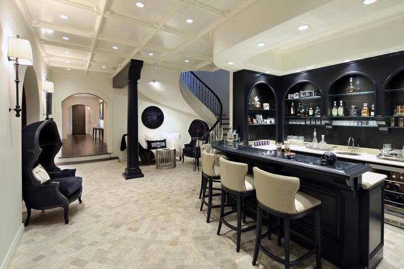 The bar area is decorated in black and white. Photo: Sotheby’s International Realty