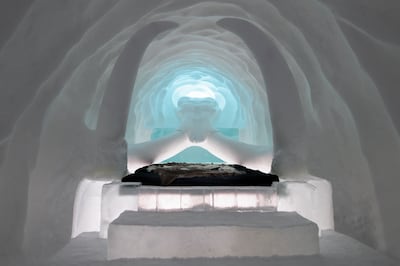 The Sacred Giant suite has a bed between snow-carved mammoth tusks. Designed by AnnaSofia Maag, Emilia Elisson, My Flink, Oscar Insulander. Photo: Asaf Kliger / IceHotel32