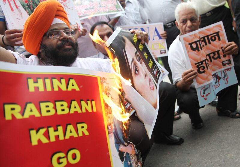 epa02843451 Activists and members of 'Fight Against Terrorism Society' participate in a protest against the visit of Pakistan's foreign minister to India in New Delhi, India on 27 July 2011. Pakistan Foreign minister is on a two-day visit to India and is expected to unveil a host of confidence-building measures (CBMs) across the divided halves of Kashmir. Foreign ministers of both countries began their first talks in a year and will discuss on all issues, including terrorism and the Kashmir issue, sources said.  EPA/ANINDITO MUKHERJEE