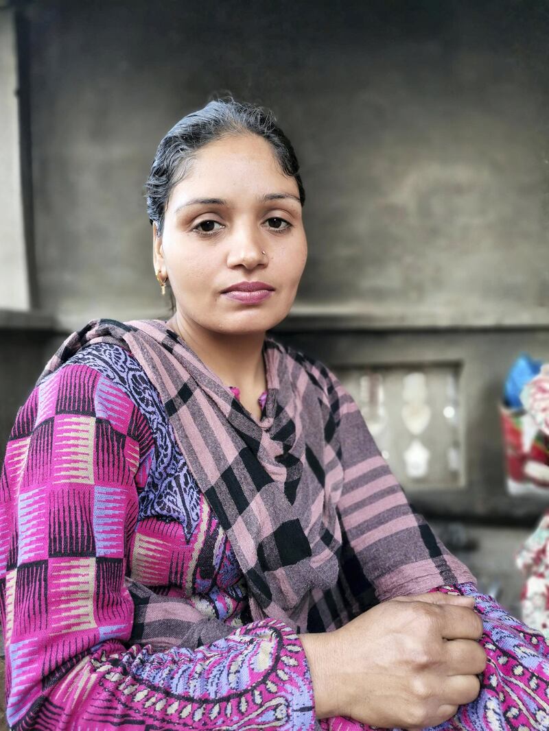 Amandeep Kaur, 38, wakes up at 4:00am every day. She feeds the livestock, milks the buffaloes and after finishing household chores, goes to the farm to supervise the wheat crops that her husband sowed before leaving for protests in Delhi. Taniya Dutta for The National