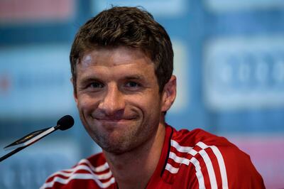 Bayern Munich's Thomas Mueller smiles during a press conference ahead of the International Champions Cup football match between Bayern Munich and Arsenal in Shanghai July 18, 2017. 
Bayern Munich will play against Arsenal in Shanghai on July 19.  / AFP PHOTO / Johannes EISELE