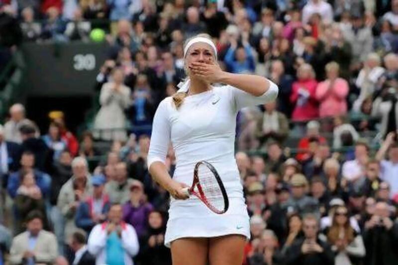 Sabine Lisicki reacts after the German knocked out women's No 1 Maria Sharapova out of Wimbledon for a place in the quarter-finals.