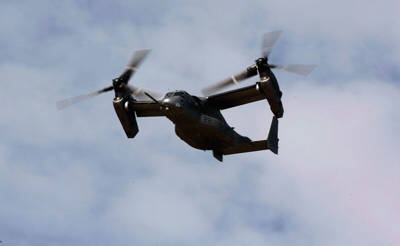 The tilt-rotor Bell/Boeing V-22 Osprey manoeuvres at the Farnborough Airshow in 2006.