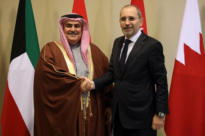 Bahraini Foreign Minister Sheikh Khalid bin Ahmed Al Khalifa greets Jordanian Foreign Minister Ayman Safadi at the King Hussein Convention Centre at the Dead Sea. Reuters