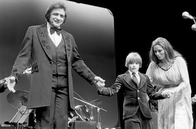 Johnny Cash with his son John Carter Cash and wife June Carter, live at Wembley Conference Centre, London 01/03/1979 (Photo by Terry Lott/Sony Music Archive/Getty Images)