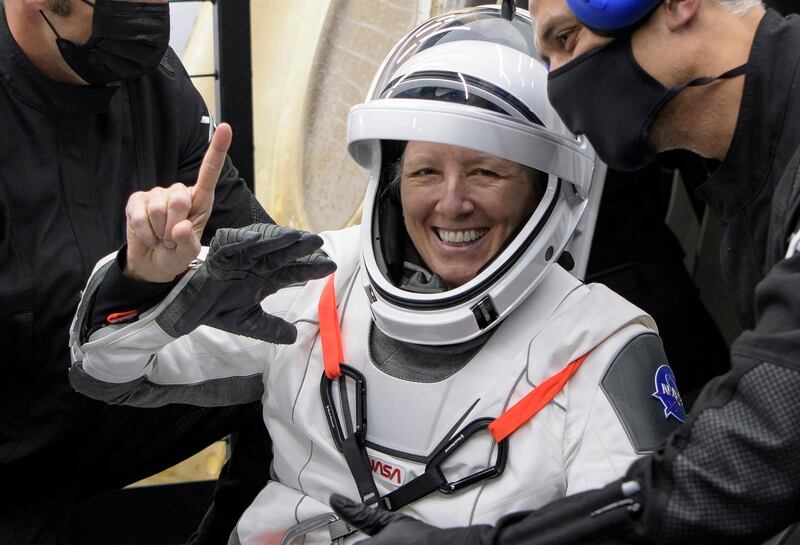 Nasa astronaut Shannon Walker emerges from the SpaceX Crew Dragon capsule onboard the SpaceX GO Navigator recovery ship. AP Photo