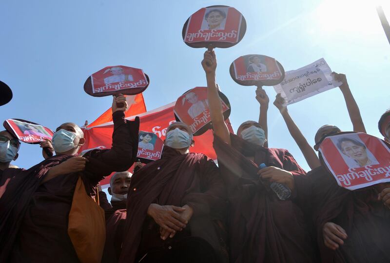 Buddhist monks take part in a demonstration against the military coup in Naypyidaw on February 13, 2021. / AFP / STR
