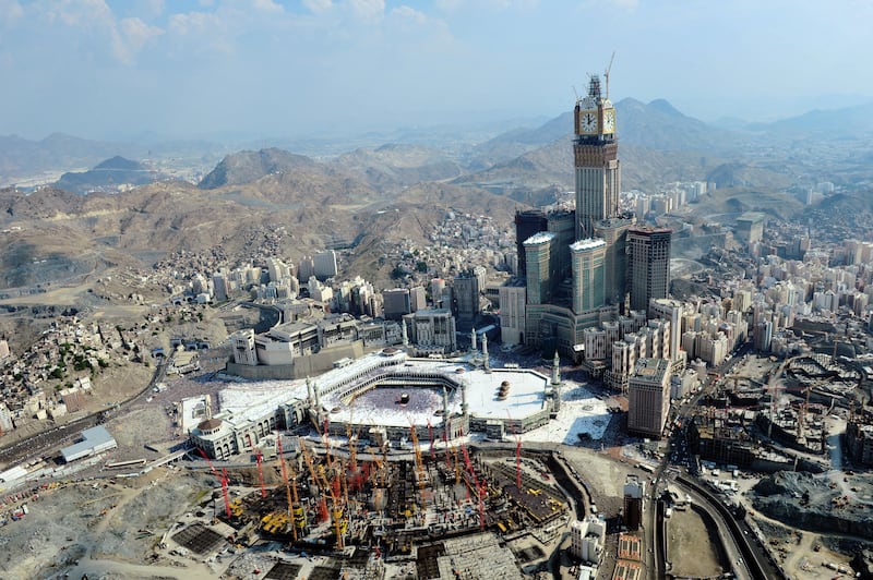 Pictured on November 17, 2010, construction is under way on an expansion of the Grand Mosque of Makkah, including a multi-level extension, new tunnels and stairways, as well as more minarets. Abraj Al Bait, including the clock tower, was build on the site of an Ottoman citadel. AFP