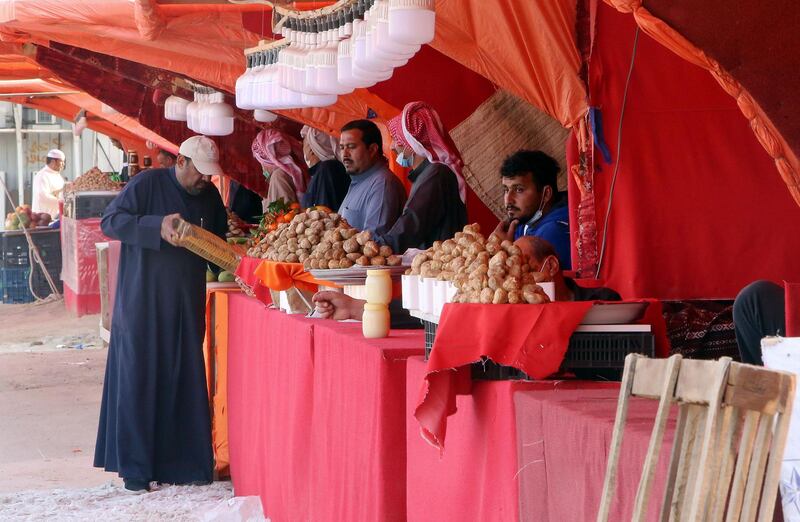 Kuwaiti vendors sell desert truffles at a market in Kuwait City. The abundance of the desert truffle means that unlike its European counterpart, it is the main component of a dish rather than a seasoning. AFP