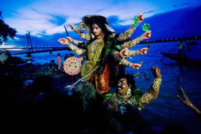An idol of Hindu goddess Druga before its immersion in the River Ganges at the Durga Puja festival in Kolkata, West Bengal.