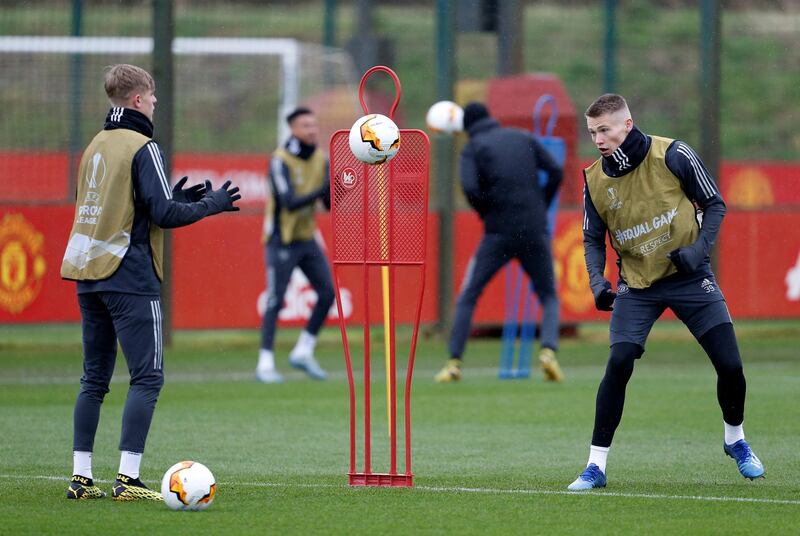 Manchester United's Scott McTominay, right, during training. Reuters