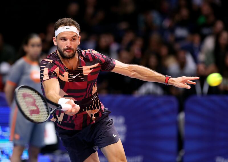 Falcons' Grigor Dimitrov takes on the Eagles' Nick Kyrgios. Chris Whiteoak / The National