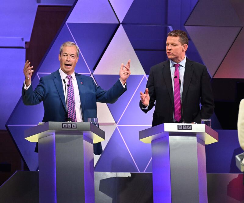 Reform UK leader Nigel Farage, left, disputes a point with Plaid Cymru's Rhun ap Iorwerth during the BBC Election Debate in London. Photo: PA News