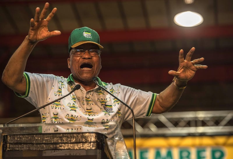 Outgoing African National Congress (ANC) President and current South African President Jacob Zuma gestures as he addresses delegates at the 54th ANC conference in Johannesburg on December 18, 2017. 
South African deputy president Cyril Ramaphosa was narrowly elected head of the ruling ANC party, winning a bruising race that exposed rifts within the organisation that led the fight against apartheid. / AFP PHOTO / MUJAHID SAFODIEN