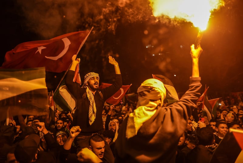 Protesters gather outside the US consulate in Istanbul, Turkey, in support of Palestinians after an air strike on a Gaza city hospital killed hundreds earlier this week. EPA