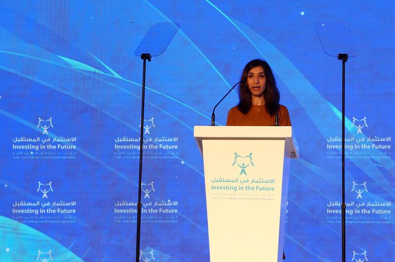 epa07115619 Nadia Murad, co-recipient of the 2018 Nobel Peace Prize, speaks during the opening ceremony of the Investing in the Future conference in Sharjah, UAE, 24 October 2018. According to reports, Nadia urged government and non-governmental organizations to join efforts of rebuilding Sinjar, the Yazidi homeland, to enable the people to return to their homes they fled from during the fighting with Islamic State (IS) militants. Murad is a 24-year-old Yazidi woman who advocates on behalf of her community and survivors of genocide and sexual violence.  EPA/MAHMOUD KHALED