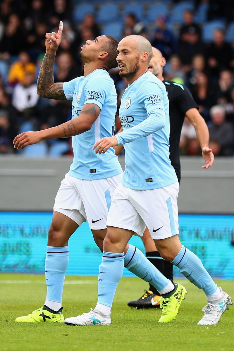 REYKJAVIK, ICELAND - AUGUST 04: Gabriel Jesus of Manchestr City  celebrates scoring his sides first goal with David Silva of Manchester City during a Pre Season Friendly between Manchester City and West Ham United at the Laugardalsvollur stadium on August 4, 2017 in Reykjavik, Iceland.  (Photo by Ian Walton/Getty Images)