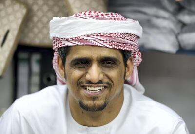 Abu Dhabi, United Arab Emirates - July 30, 2019: Hassan Umar, 35, from Hadraumat, Yemen talks about Hajj at Salmin Trading Shops. Monday the 30th of July 2019. Downtown, Abu Dhabi. Chris Whiteoak / The National