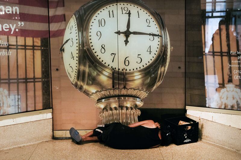 A homeless person sleeping in Grand Central Terminal, in Midtown Manhattan, New York. A gunman killed one homeless man and wounded a second in Lower Manhattan, early on Saturday, March 12. Getty Images / AFP