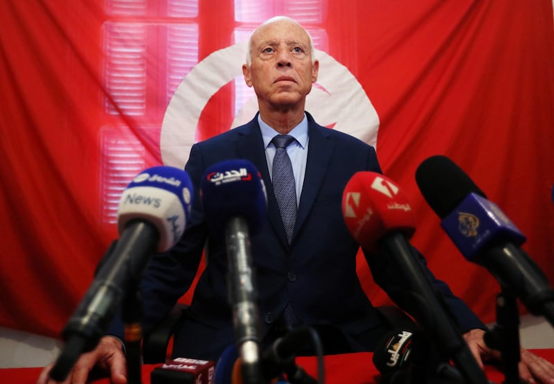 Presidential candidate Kais Saied speaks as he attends a news conference after the announcement of the results in the first round of Tunisia's presidential election in Tunis, Tunisia. REUTERS